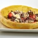 puffy pancake with strawberries and bananas puffy pancake with strawberries and bananas