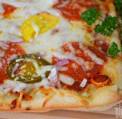 Spicy Pepper and Cheese Crusted Pizza