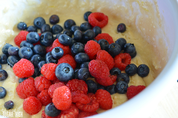 Raspberries and blueberries added to muffin batter