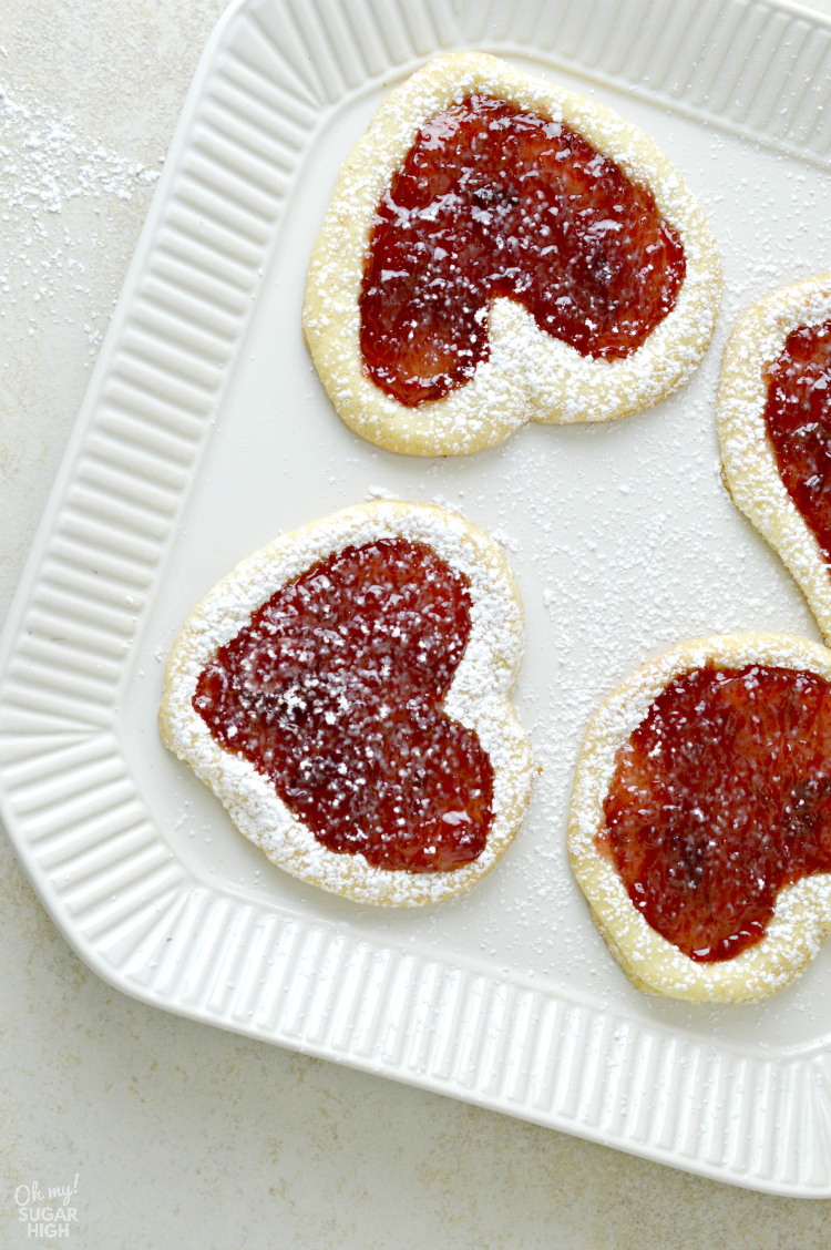 Heart sugar cookies filled with cherry jam