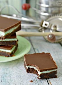 Love mint and chocolate desserts? You'll love this fudge mint brownies recipe. This layered brownie is oh so delicious and makes a great dessert any time of year, especially St. Patrick's Day!