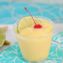 Cool off with this blended mocktail. This tropical non-alcoholic summer drink is perfect for all ages and includes mango, pineapple and coconut. Serve it at your next celebration including pool parties and summer cookouts.