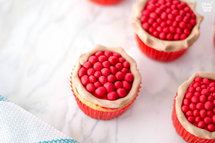 These cherry pie cupcakes are a show stopper at any summer cookout or Thanksgiving dessert table. Wow the crowd with these fun vanilla cupcakes that look like they have a cherry pie sitting on top! With just a few necessary ingredients, you'll be surprised how easy these cherry cupcakes are to make for any celebration.