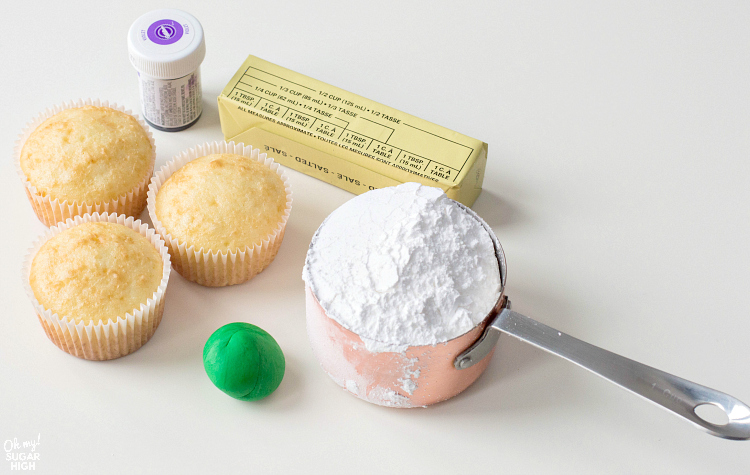 ingredients to make buttercream icing for a dozen flower cupcakes