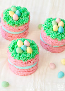 Wondering what to make for Easter dessert? Try these adorable mini Easter cakes with chocolate eggs and green grass. These colorful pink cakes are sure to brighten up any dessert table this spring!