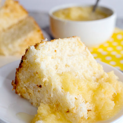 Pineapple cake is the stuff dreams are made of, especially if you are looking for a low calorie, low fat dessert option! Only two ingredients are required to make this angel food cake with pineapple. You can skip the crushed pineapple topping and enjoy this light cake with chopped fresh fruit or a dollop of whipped cream. So many possibilities! This pineapple angel food cake recipe is only 160 calories and 5 Weight Watchers SmartPoints when eaten plain.
