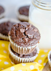 Double chocolate banana muffins stacked