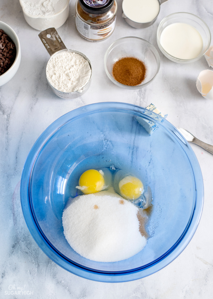 Mixing up eggs sugar and vanilla in bowl