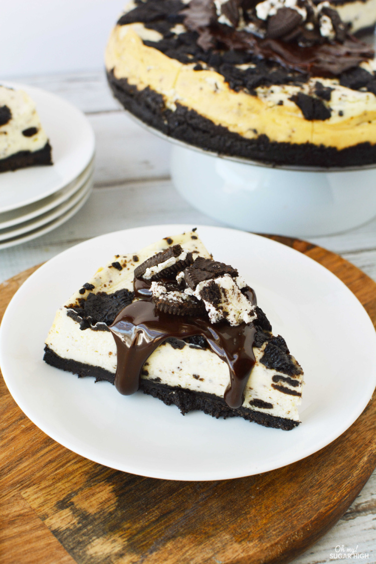 Oreo Cheesecake is extra easy when made in an Instant Pot! This pressure cooker cheesecake is both rich and delicious. It features an Oreo crust and is topped with hot fudge and cookie crumbles, making it the ultimate dessert!