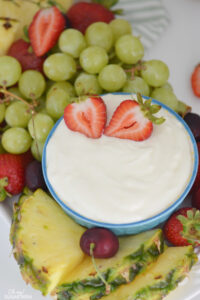 This marshmallow fluff fruit dip recipe is made with just four ingredients and takes less than five minutes to make. Serve it with fresh fruit for an easy appetizer, snack or dessert.